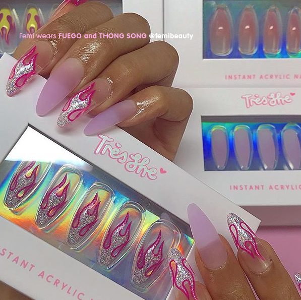 Influencer wearing Tres She instant acrylic press on nails in matte lilac jelly long tapered ballerina shape